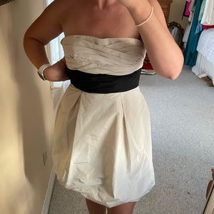 BCBG size 4 strapless bubble dress with a black ribbon accent on the waist
